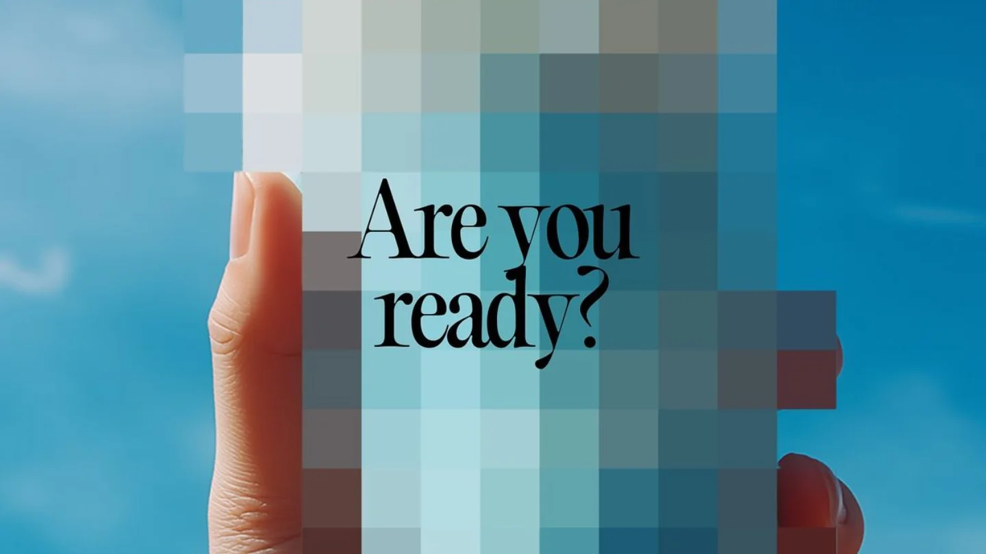 Hand holding a pixelated screen reading Are you ready, representing campaign concepts at Growth Yogi