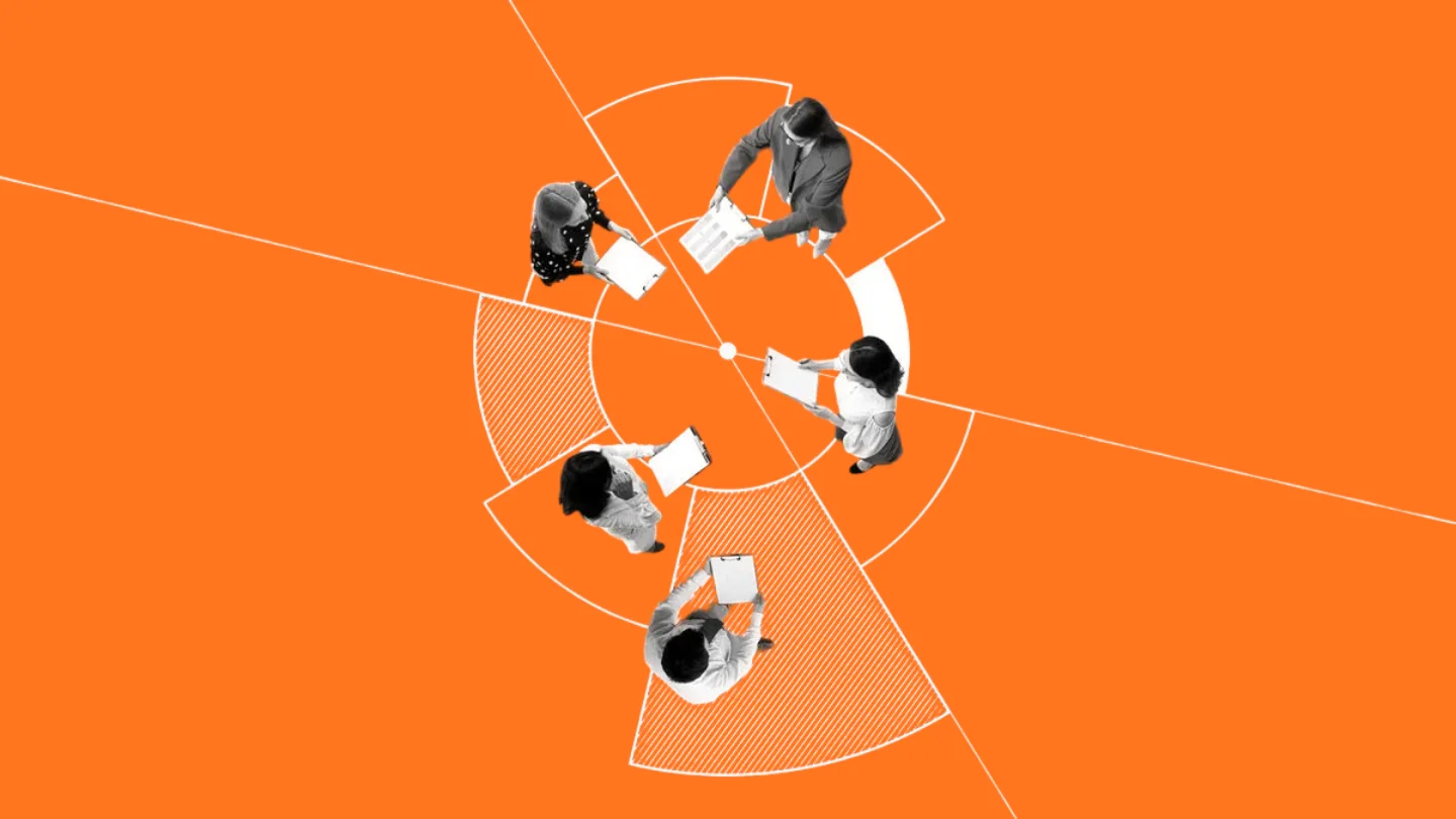 Overhead view of colleagues arranged around a radial diagram on orange, representing corporate communication at Growth Yogi